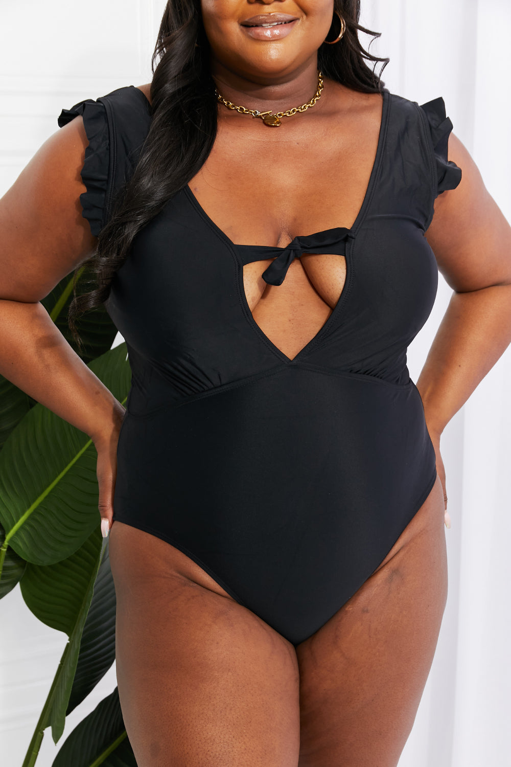 Seashell Ruffle Sleeve One-Piece in Black - Lecatta