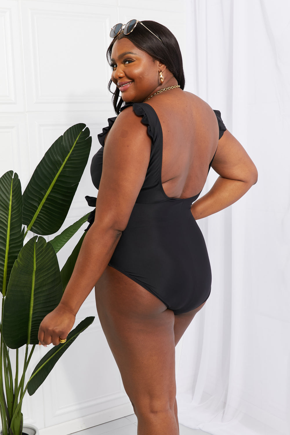 Ruffle Faux Wrap One-Piece in Black - Lecatta